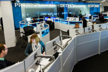 People working in an office Description automatically generated