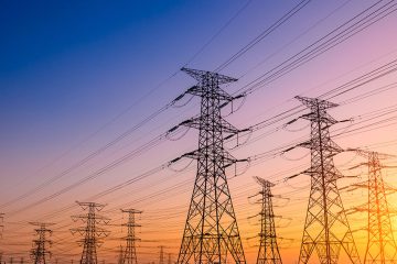 High voltage electricity tower sky sunset landscape,industrial background.