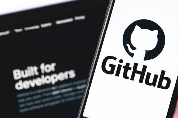 GitHub logo on the screen smartphone and notebook closeup. GitHub is the largest web service for hosting and developing IT projects.